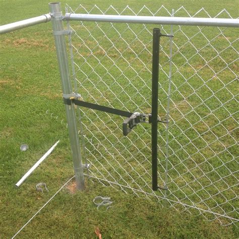 chain link fence stretcher for skid steer|pulling chain link fence tight.